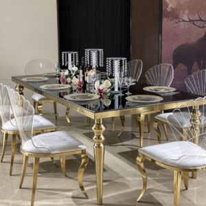Black glass dining table with polished gold turned legs for wedding decor | Xingchen Furniture