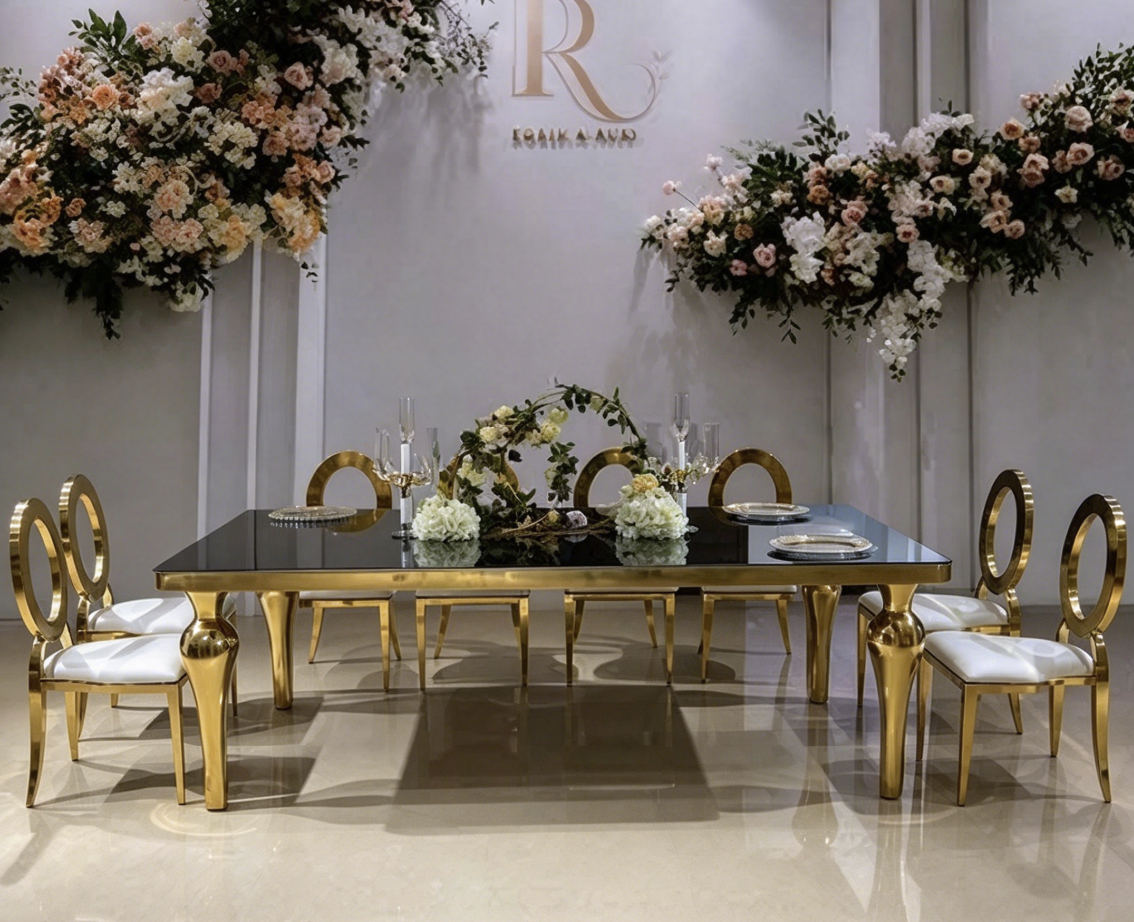 Black top gold leg console table with luxury floral wedding backdrop