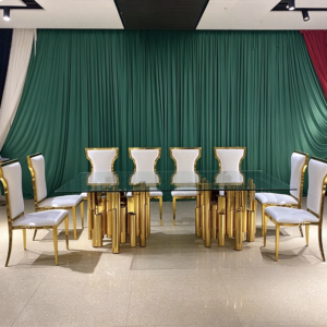 Glass top wedding banquet table with gold column base manufactured by Xingchen Furniture