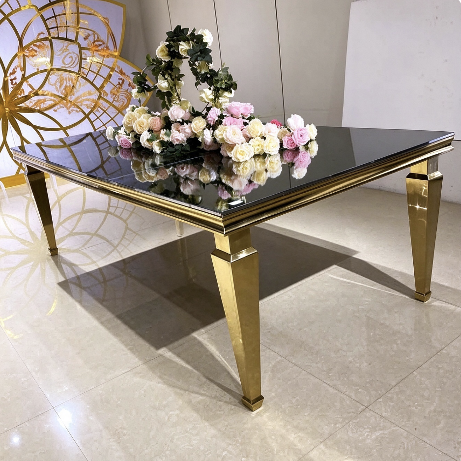 Black glass top gold tapered stainless steel event dining table