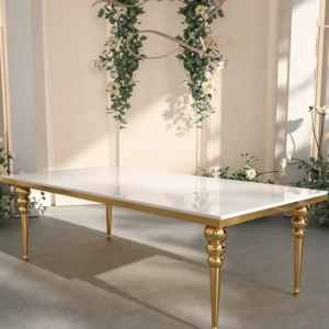 White top gold leg wedding table with elegant floral decor for ceremony venue